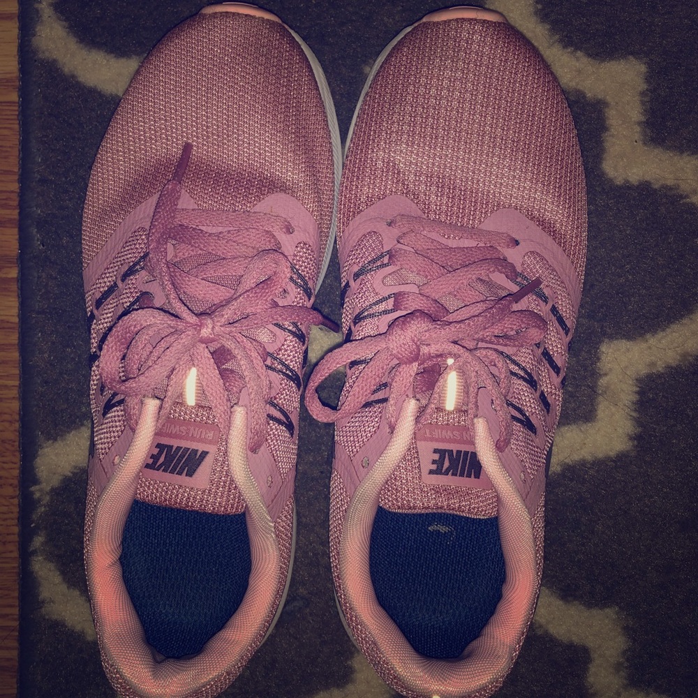Pink nike running shoes